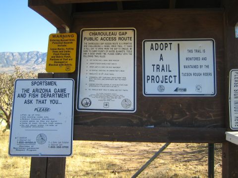 1968 Ford Mustang - Photograph of a trailhead signboard, not a vehicle technical document.