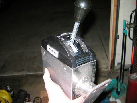 1985 Ford Bronco - Close-up of an Art Carr shifter, a part for a vehicle's transmission.