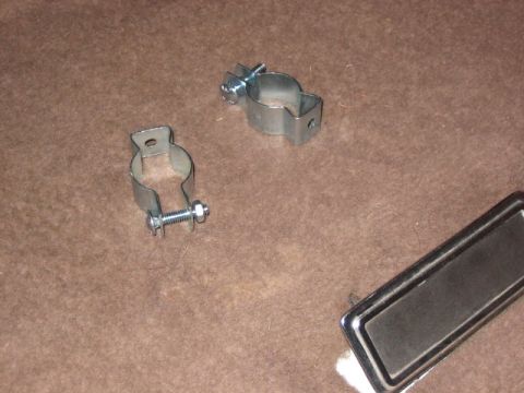 1995 Ford Bronco - These guys are 1" conduit hangers you can find at Loews, electrical section.