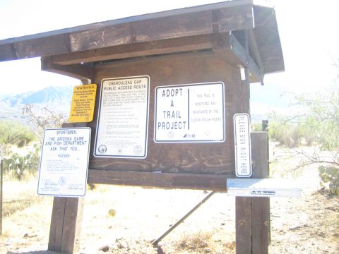 1968 Ford Mustang - Photograph of a wooden trailhead signboard in the desert, not a vehicle technical document.
