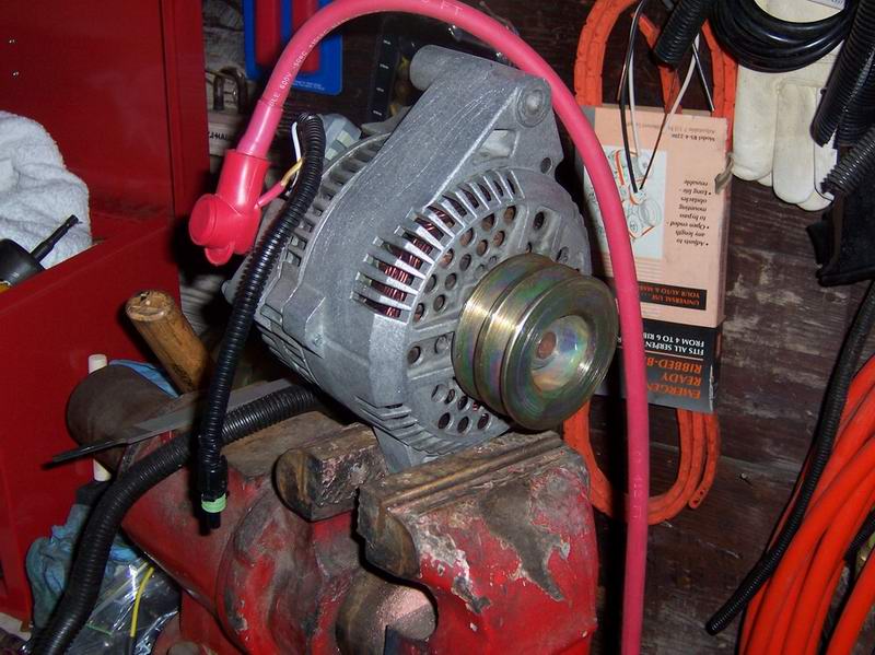 This is the long ear version of the 3G alternator.   It was originally installed in a Lincoln Mark VIII,  $17.00 from the Pick and Pull.  I decided to rebuild it before installing it in my 1983 FSB.  Replaced bearings, cleaned up the slip rings, and intalled new brushes and Voltage Regulator.

Parts:
Bearings $10.00
Regulator & brushes $25.00

Though I started with a used alternator, I have since changed it for a new one that was intended for a 93 Mercury Sable.