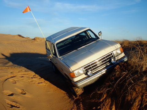 1991 Ford Bronco - Unfortunately, I couldn't get back down with that back wheel in the air (no lockers yet). But, at least I got to try out my new hi-lift. Af…