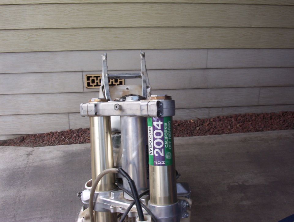 Motorcycle front forks with a 2004 California Off-Highway sticker