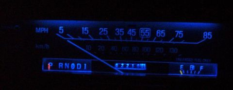 1985 Ford LTD Crown Victoria - The illuminated dashboard gauges display speed, gear selection, and fuel level.
