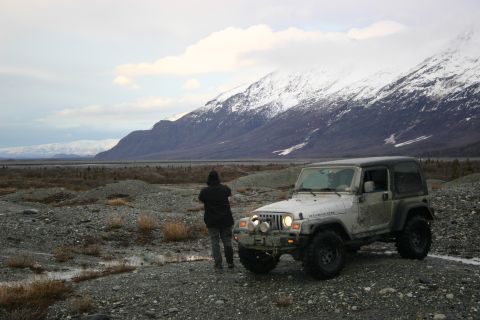 2003 Jeep TJ - 2003 Jeep TJ Rubicon parked in a rocky, mountainous landscape.