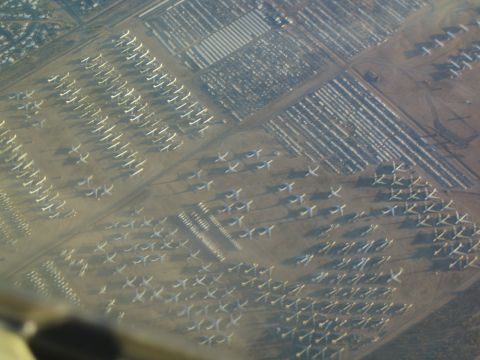 1968 Ford Mustang - Rows of decommissioned aircraft are stored in a vast desert facility.