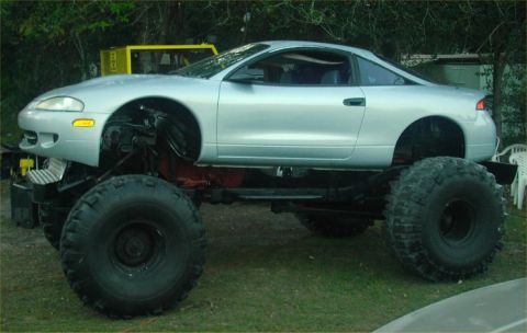 1987 Suzuki Samurai - This custom build combines a car body with a monster truck frame and tires.