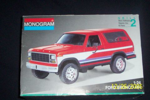 1995 Ford Bronco - Box art for a Monogram Ford Bronco model kit, showing a red and white vehicle.