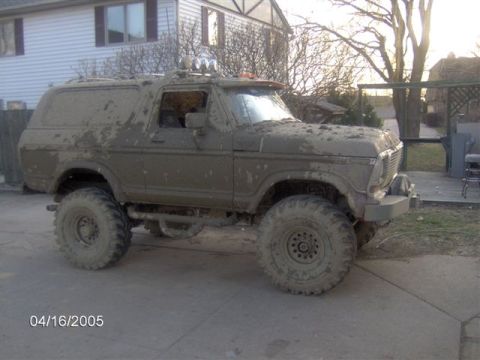 1978 Ford Bronco - This 1978 Ford Bronco is heavily covered in mud, obscuring much of its original condition.