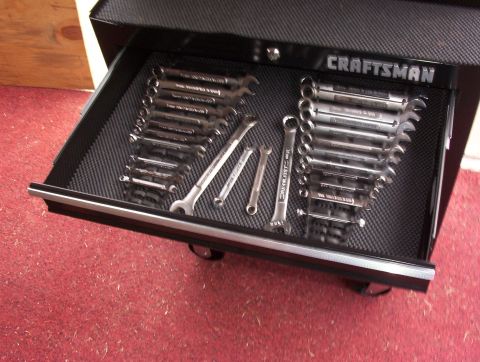 1993 Ford Bronco - A close-up view of an open Craftsman toolbox drawer, neatly organized with various wrenches.