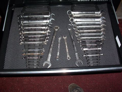 1993 Ford Bronco - A toolbox drawer contains two organized sets of wrenches and a ratcheting wrench.