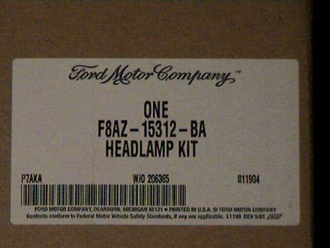 1977 Ford F-150 - Label shows Ford Motor Company part number F8AZ-15312-BA for a headlamp kit.