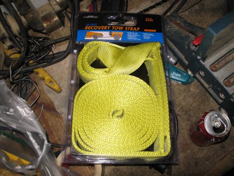 1995 Ford Bronco - A yellow tow strap is packaged with product information and graphics.