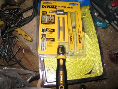 1995 Ford Bronco - DeWalt Rapid Load multi-purpose tool kit with saw blades and bits is packaged for sale.