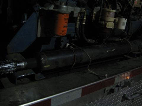 1968 Ford Mustang - Engine components including an orange filter and exhaust pipe are visible in this close-up shot.