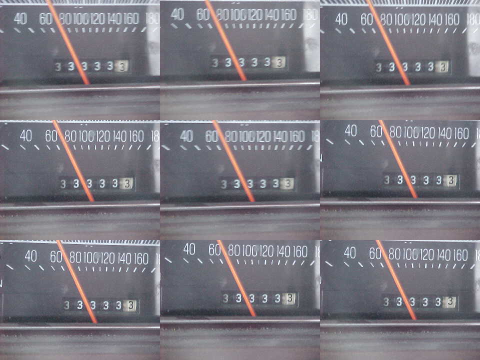Close-up of a car's odometer showing 33333 miles