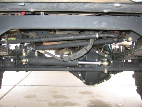 1994 Ford Bronco - Undercarriage view of steering and suspension parts on a Ford Bronco.