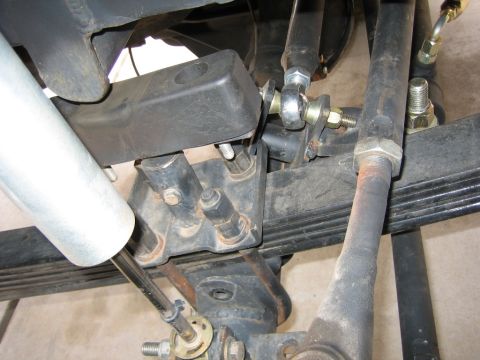 1994 Ford Bronco - Vehicle suspension parts shown in detail, including shock absorber and leaf springs.