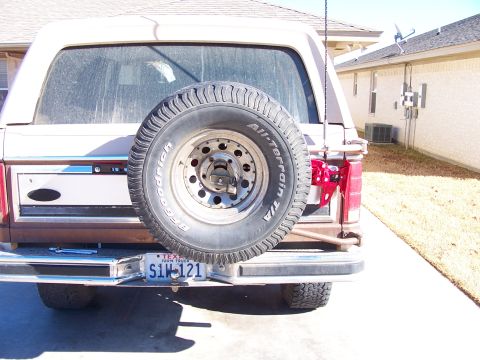 1982 Ford Bronco - Rear view of a 1982 Ford Bronco, showing the spare tire and license plate.