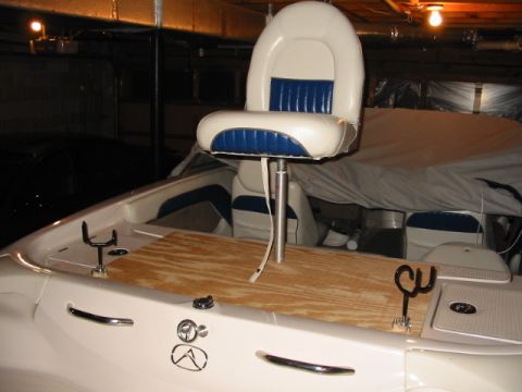 1988 Ford Bronco - Rear rod holder made from 1/2 inch plywood and rod holders put in each corner. I have painted it white. It is made narrow so I can get to t…
