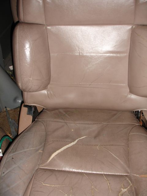 1993 Ford Taurus - This is a worn leather car seat, not a 1993 Ford Taurus.
