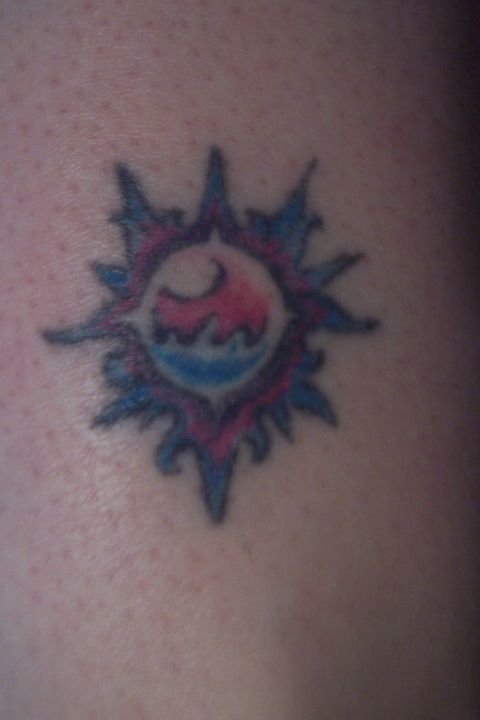1987 Ford Bronco - A colorful tattoo design is visible on the skin, with a watermark at the bottom right.