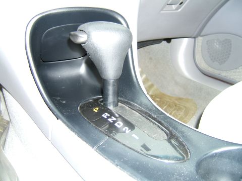 1998 Ford Taurus - Interior view of a 1998 Ford Taurus showing the automatic transmission shifter and gear selection display.