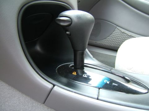 1998 Ford Taurus - Interior view of an automatic gear shifter with visible drive mode indicators.