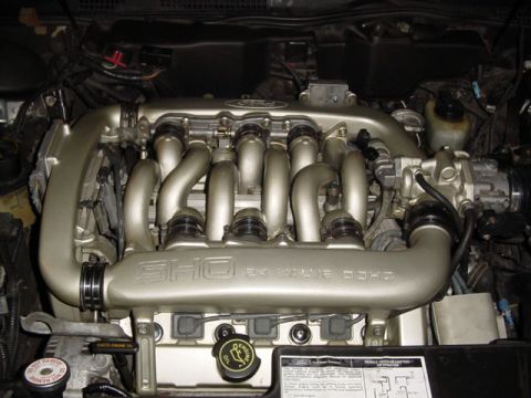 1998 Ford Taurus - Close-up of a Ford SHO 3.0L V6 engine, showing the intake manifold and engine components.