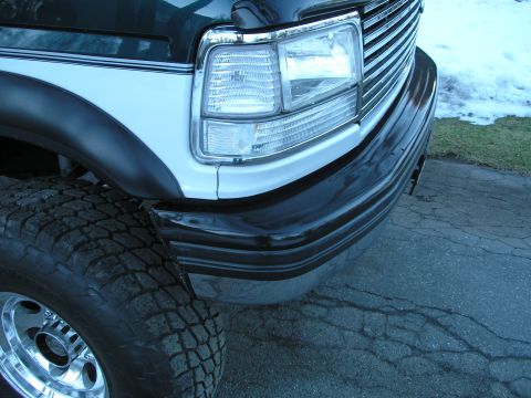 1994 Ford Bronco - The grille and headlight design suggest a 1992-1996 Ford F-Series truck, not a 1994 Bronco.