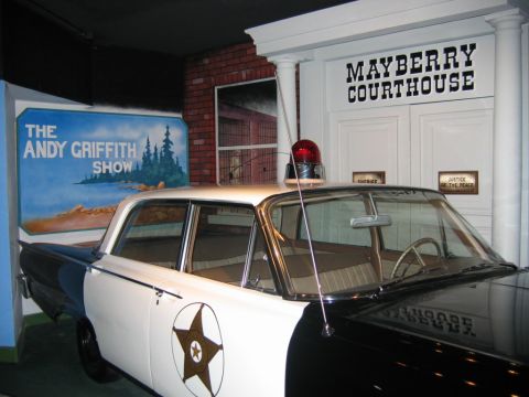 1985 Ford Crown Victoria LTD - A staged scene a police car and a backdrop of the Mayberry Courthouse and the Andy Griffith Show.