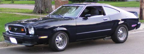 1978 Ford Mustang II - This 1978 Ford Mustang II coupe is seen from a three-quarter front angle, parked on a residential street.