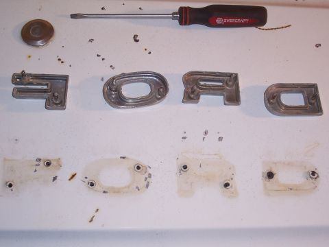 1978 Ford Bronco - The letters can be removed by prying either side of the letter with a small flathead screwdriver. Notice the prongs and the holes that they…