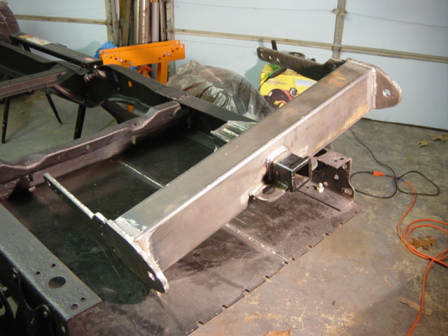 All done except the top plate and the reinforcement around the shackle points.  Oh, and still need four more holes in the frame and the brackets to support the back of the skidplate.  Maybe not so done.