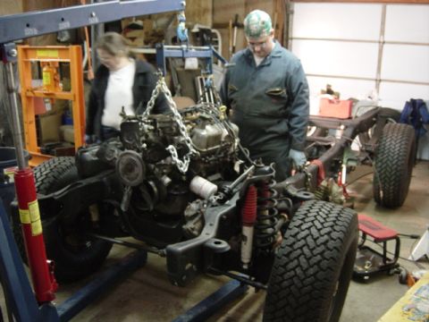 1991 Ford Bronco - Axle back together. Steering back on. New steelies and 33's on. 302 going back where it belongs.