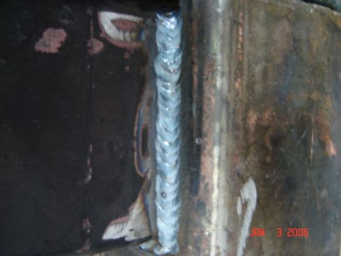 1982 Nissan Titan - A close-up view of a metal weld seam, with a date stamp indicating July 3, 2006.