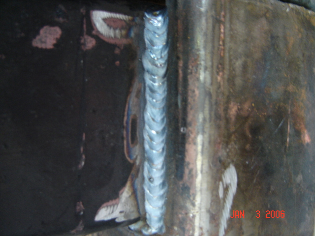 Close-up of a weld on a metal frame. Date stamp says July 3, 2006