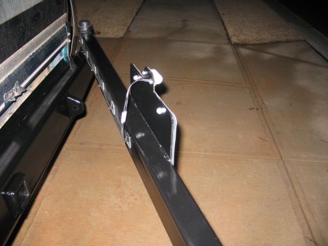 1996 Ford Bronco - Close-up view of a black custom bumper bracket, likely for an aftermarket upgrade.