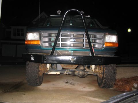 1996 Ford Bronco - This Ford truck features a heavy-duty aftermarket bumper and a protective hoop over the grille.