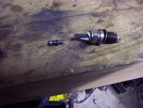 1993 Ford Probe - STEP 4: You need a post! what a cheap way an old spark plug use hammer to break ceramic. cut a piece off! thats your post!