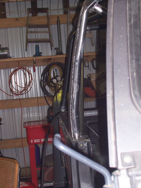 1988 Suzuki Samurai - Custom roll cage installed in a vehicle, likely for off-road use.