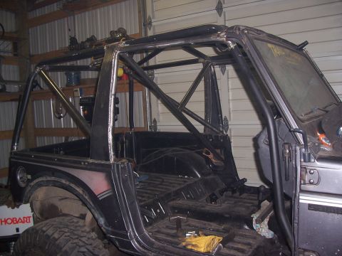 1988 Suzuki Samurai - This Suzuki Samurai is undergoing modifications with a custom roll cage and stripped interior.