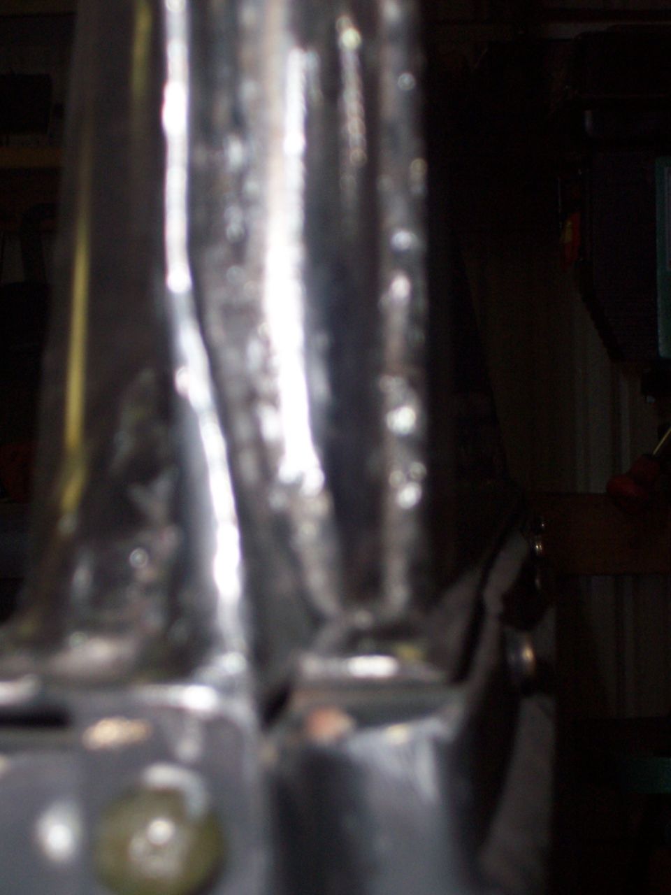 Chrome roll cage tubing, close-up view