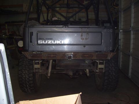1988 Suzuki Samurai - Rear view of a 1988 Suzuki Samurai showing its tailgate and aftermarket bumper.
