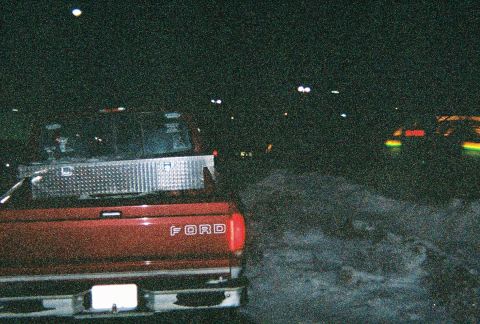 1996 Ford F-150 - Rear view of a 1996 Ford F-150 pickup truck at night, equipped with a toolbox.
