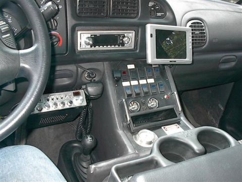 2001 Dodge 1500 - Interior view of a 2001 Dodge 1500, a CB radio and a mounted monitor.