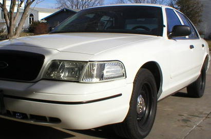 2000 Ford Crown Victoria - Front 3/4 view of a white 2000 Ford Crown Victoria.