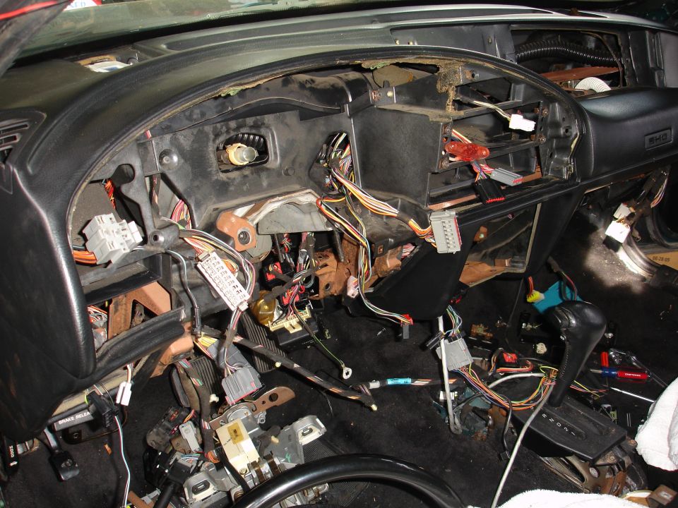1993 Ford Taurus interior, dashboard removed showing wiring harness and components