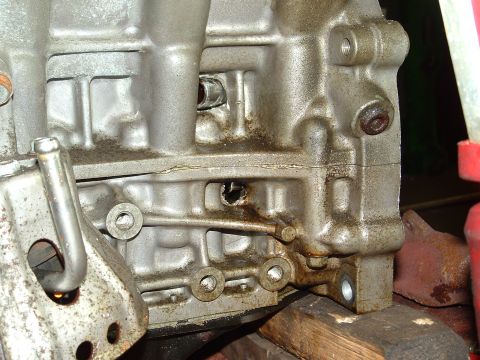 1996 Ford Probe - Engine block section with visible damage and mounting hardware. No specific vehicle identified.