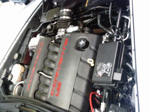 1986 Ford Bronco - Close-up of a Corvette LS1 engine, showing valve covers and intake manifold.